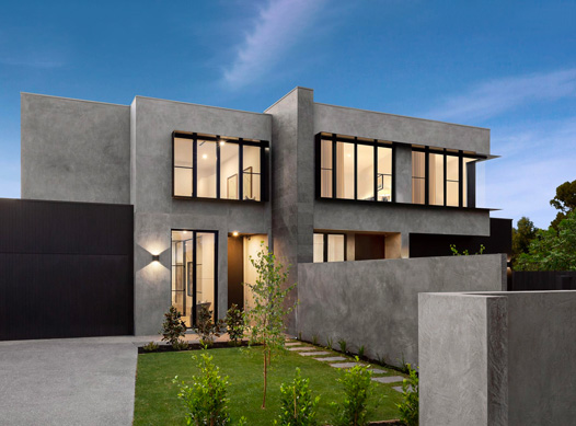 Bambra facade: dual occupancy home with grey exterior and manicured front garden