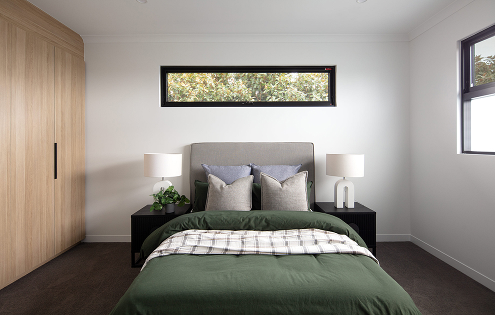 Bedroom with timber built-in wardrobes and modern decor