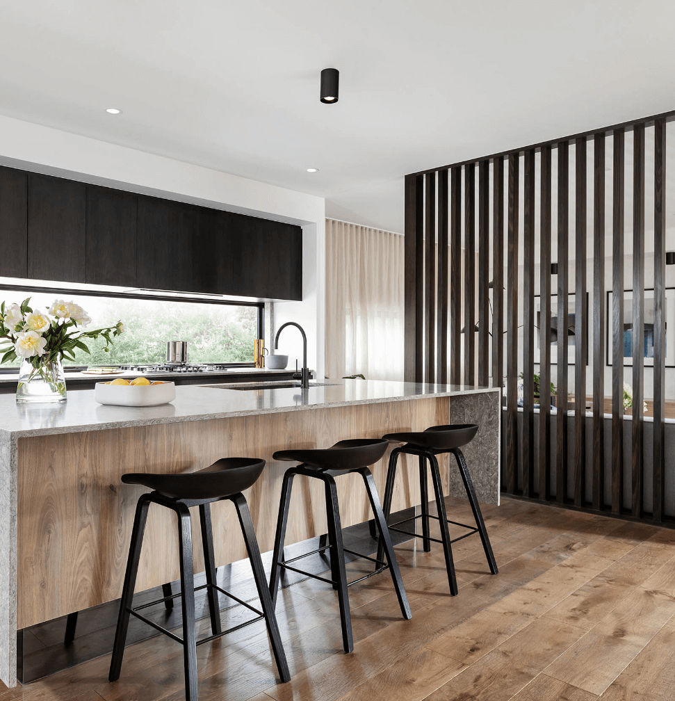 Modern kitchen with stone and timber counter finishes