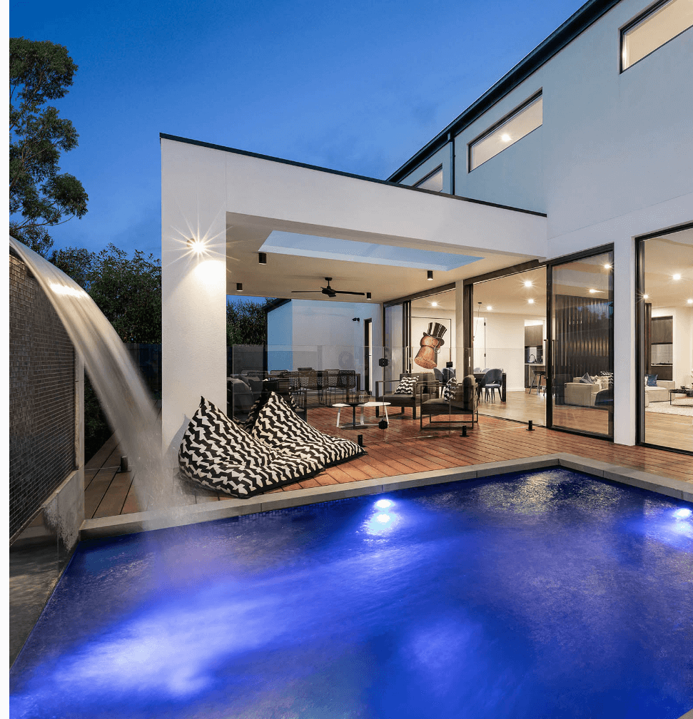 Rear of modern home with outdoor living area and blue plunge pool