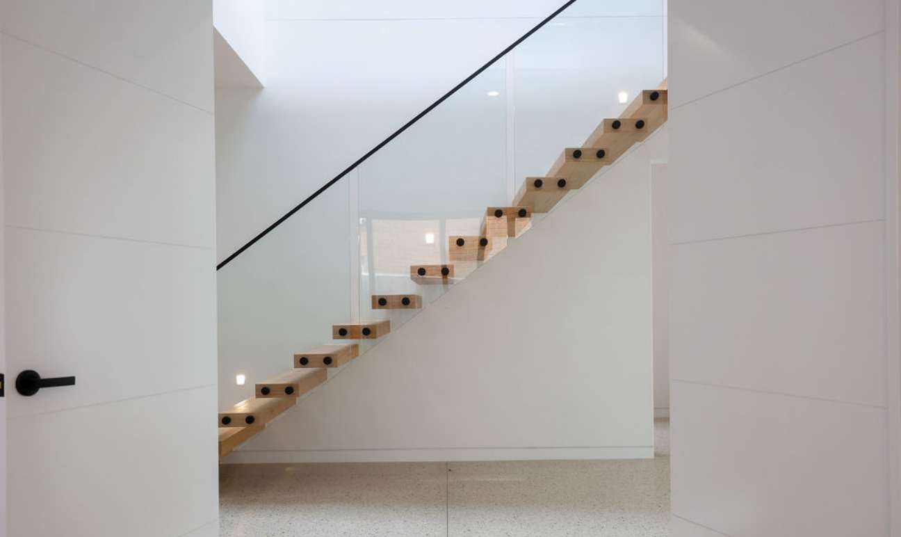 Timber and glass staircase with black detail