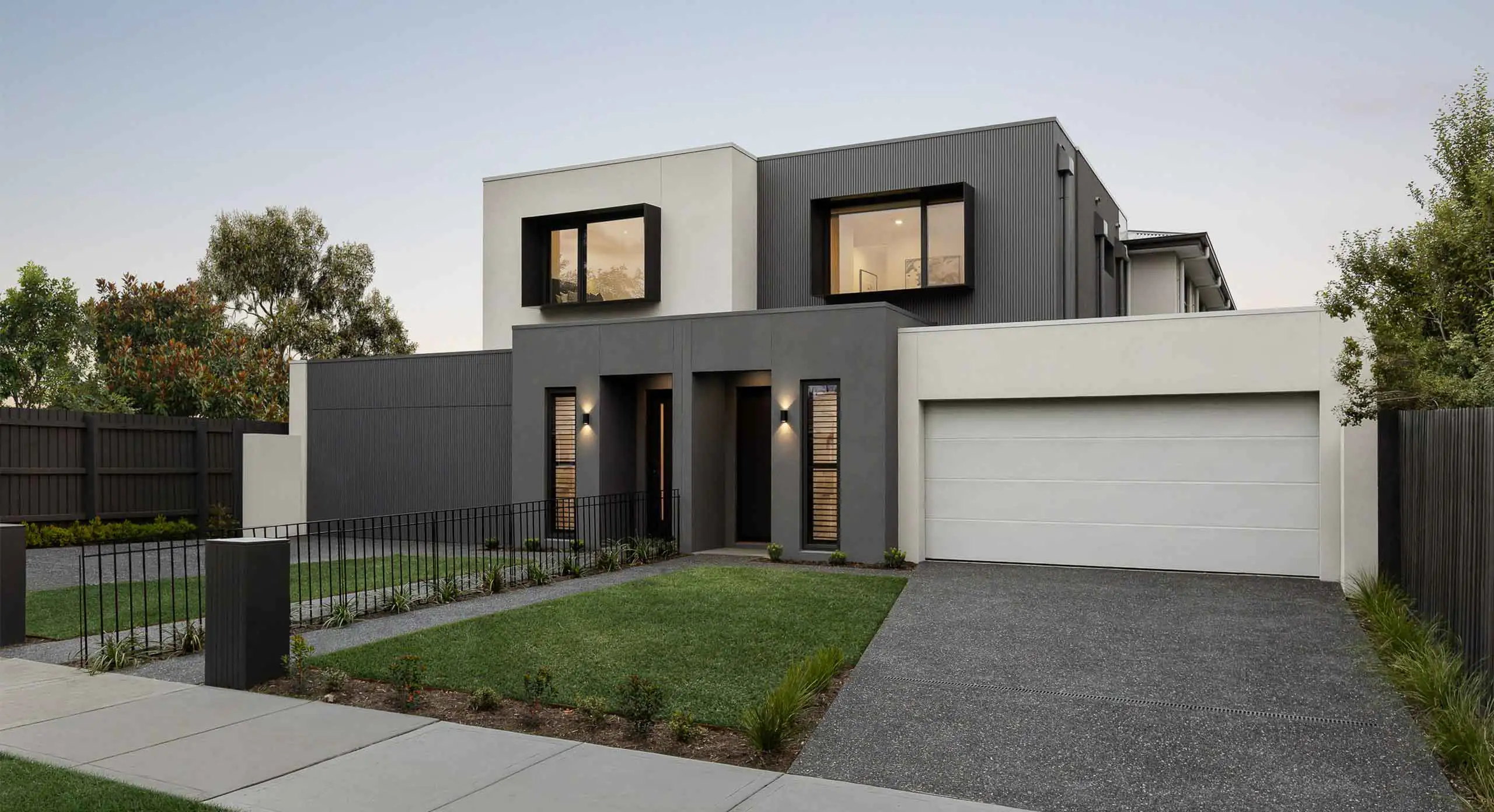 Modern Dual Occupancy home with white and grey fcade