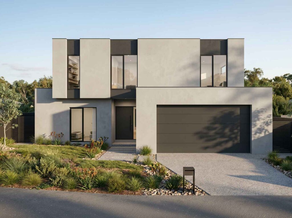 Modern two-story house with a large dark garage door and desert-inspired landscaping in front.