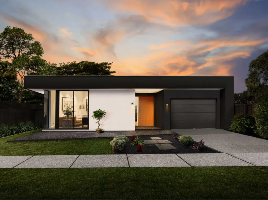 Modern single-story house with white and dark gray facade, large glass front window, orange front door, and attached garage at sunset.