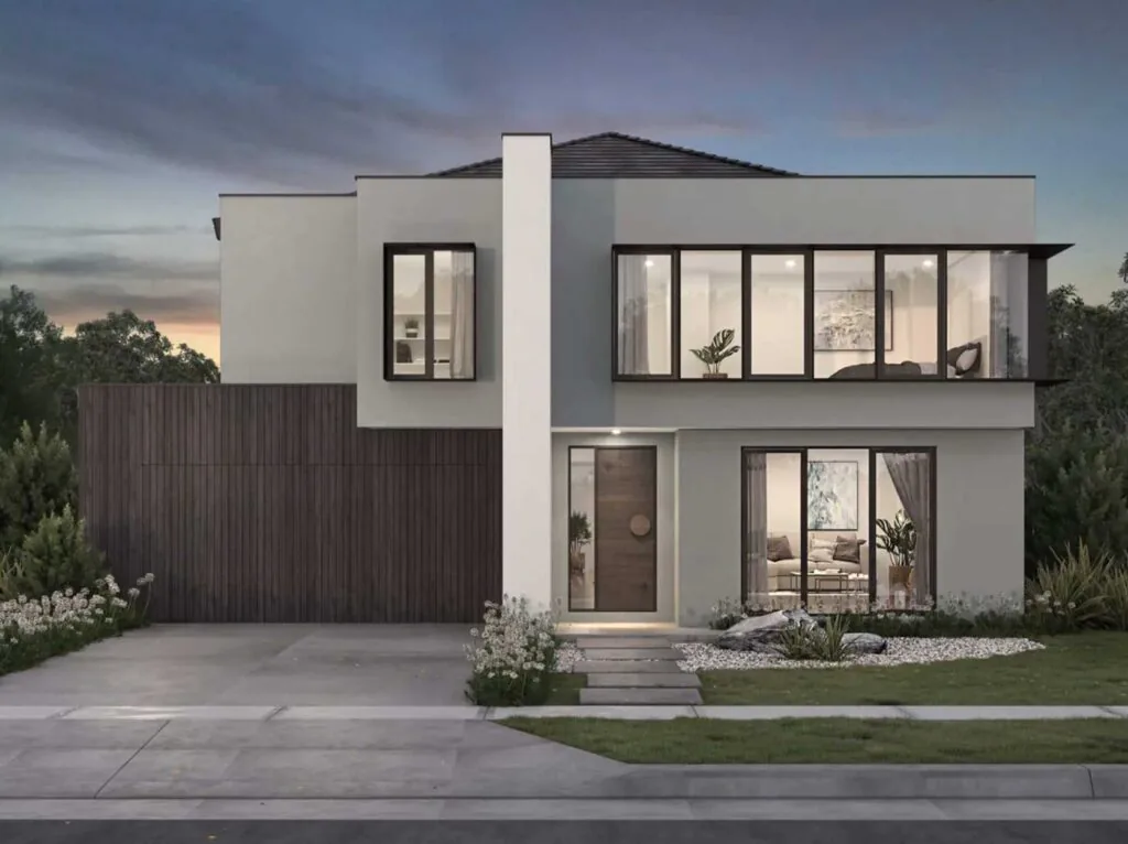 Contemporary two-story home with expansive glass walls, gray exterior, and manicured landscaping.
